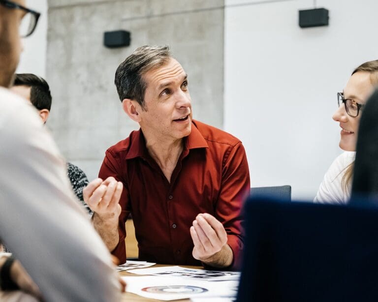 Man speaking in a business meeting